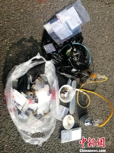 缴获的部分毒品和吸毒工具。沈阳市公安局皇姑分局供图