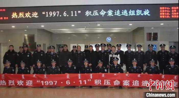 图为命案追逃组凯旋。 周连龙 摄